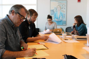 The GroundTruth team pores over applications for our inaugural climate change fellowship