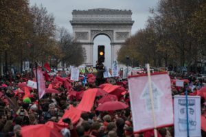 Climate justice advocates protest before the Arc de Triomphe in Paris on December 12, 2015. (Nichole Sobecki/The GroundTruth Project)