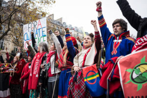 Sami activists protest for climate action in Paris on December 12, 2015. (Camilla Andersen/The GroundTruth Project)