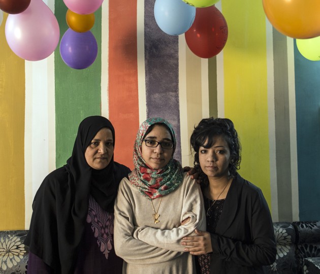 Esraa el-Taweel with her mother and sister after coming home (Photo by Roger Anis)