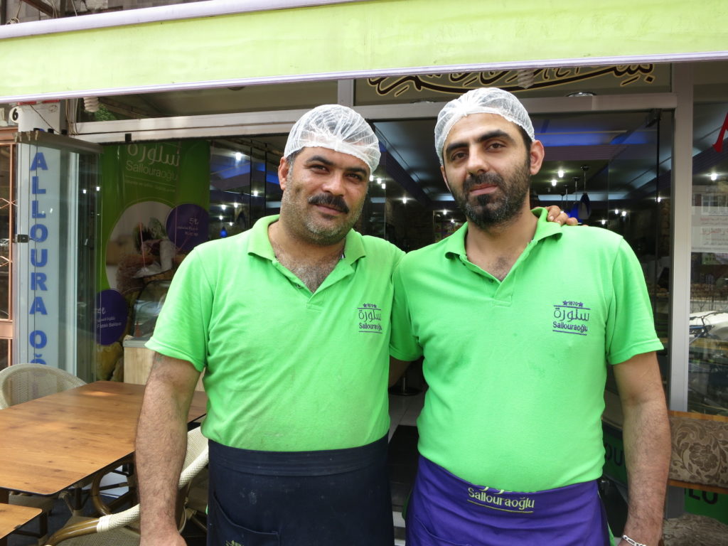 Ahmed (L) and Rashed (R) have worked together for 14 years. Like they did in Aleppo, the men run the show at Salloura in Istanbul. (Photo by Dalia Mortada/GroundTruth) 