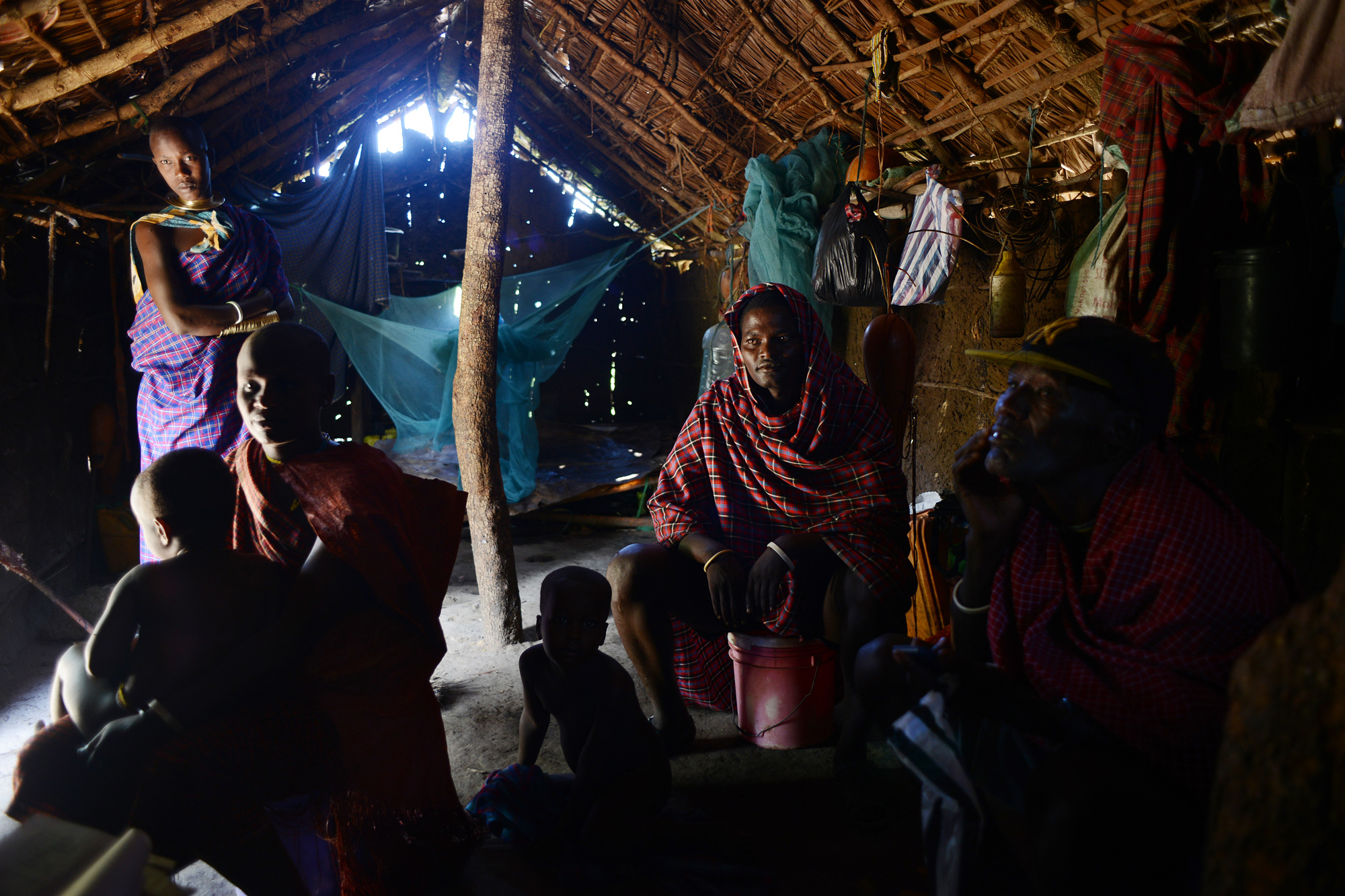 Kidomwita spends time with five members of his large family at their boma. He's an elder of the tribe and has four wives and 22 children.