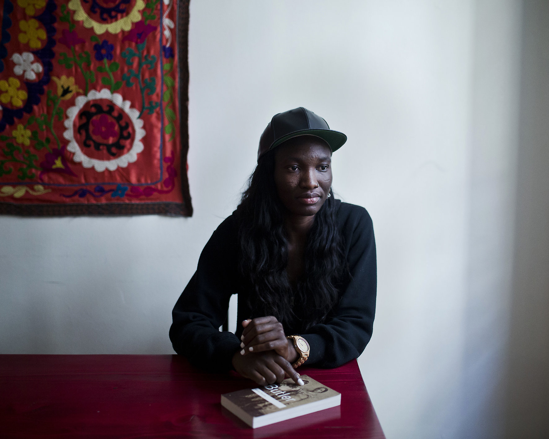 Adeola Aderemi, a woman from Nigeria, works as a yoga teacher at the Melissa Network.