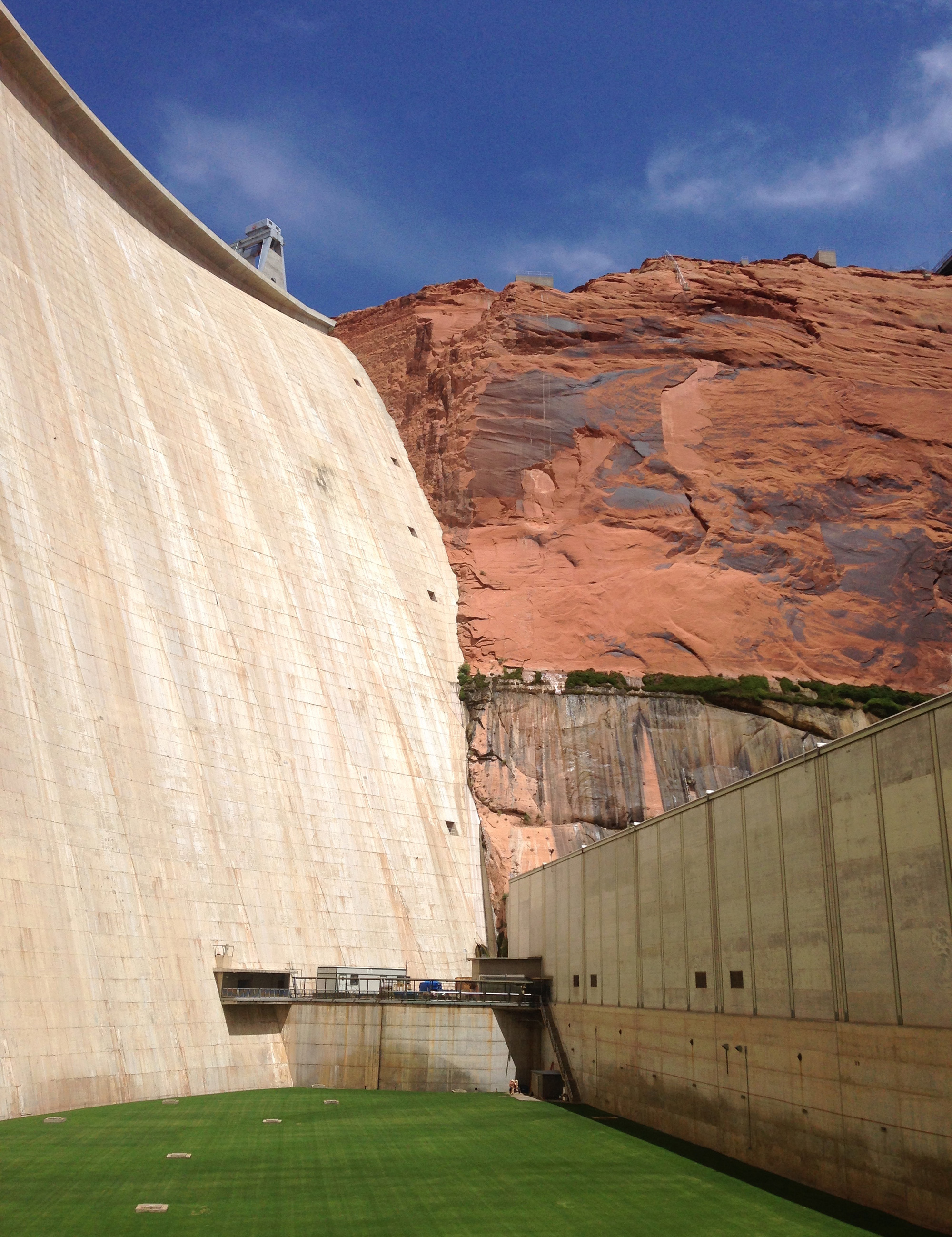 Behind the 710-foot wall of concrete seen in a view of Glen Canyon Dam, Lake Powell is the second-largest reservoir in America. (Photo by Charlotte Weiner/GroundTruth)