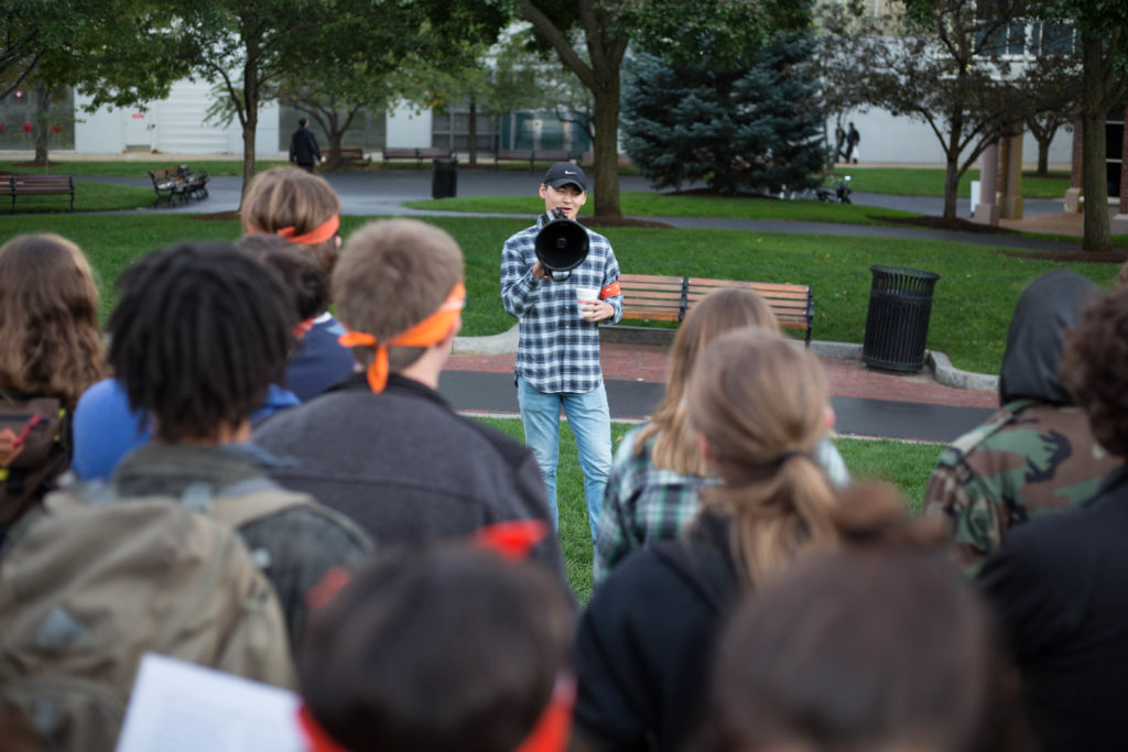 Northeastern students gathered at the camp site and discussed divestment Tuesday evening. (Photo by Alastair Pike/GroundTruth)