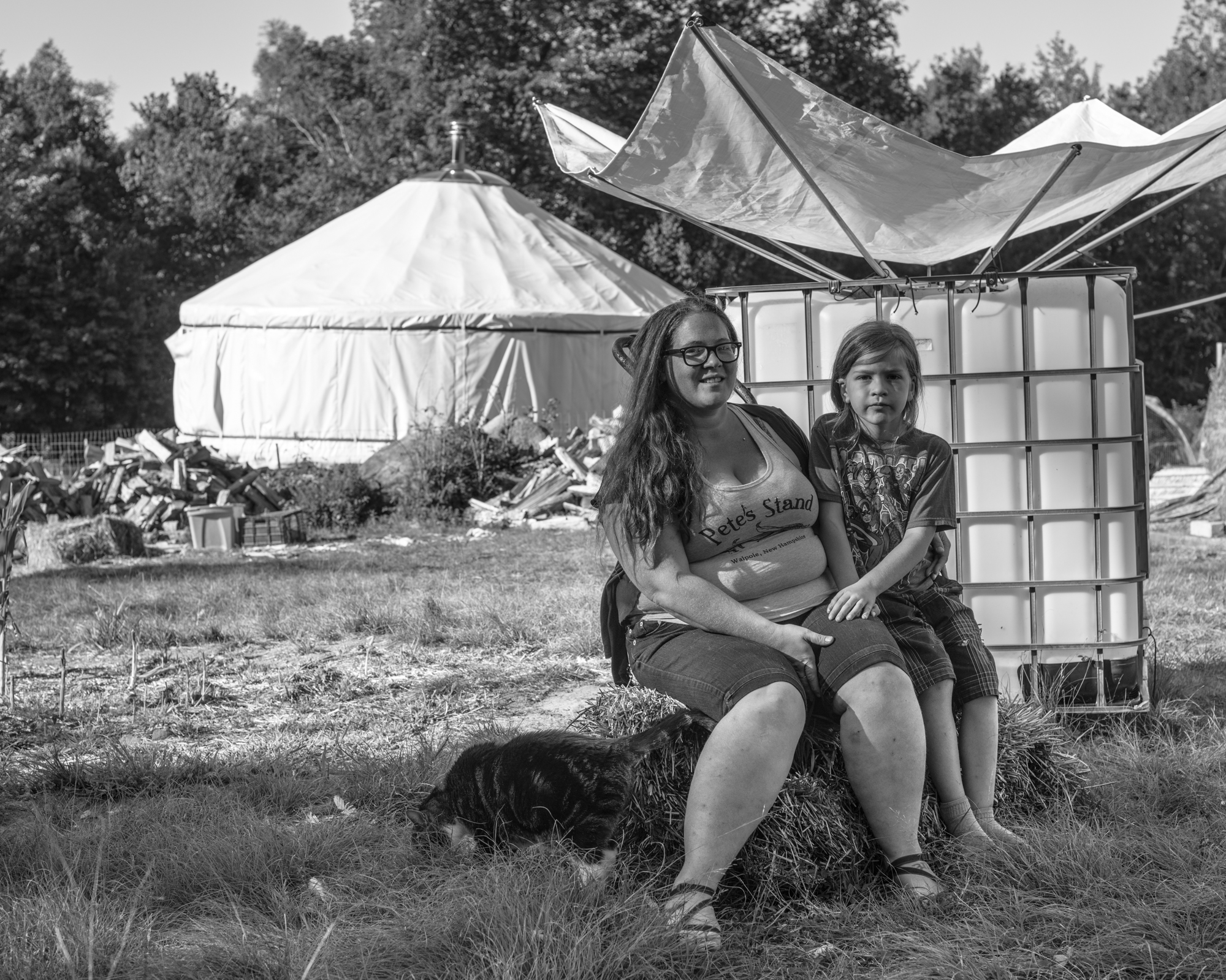 Emilie Poulin and her son Octavian on their farm in Marlboro, VT.