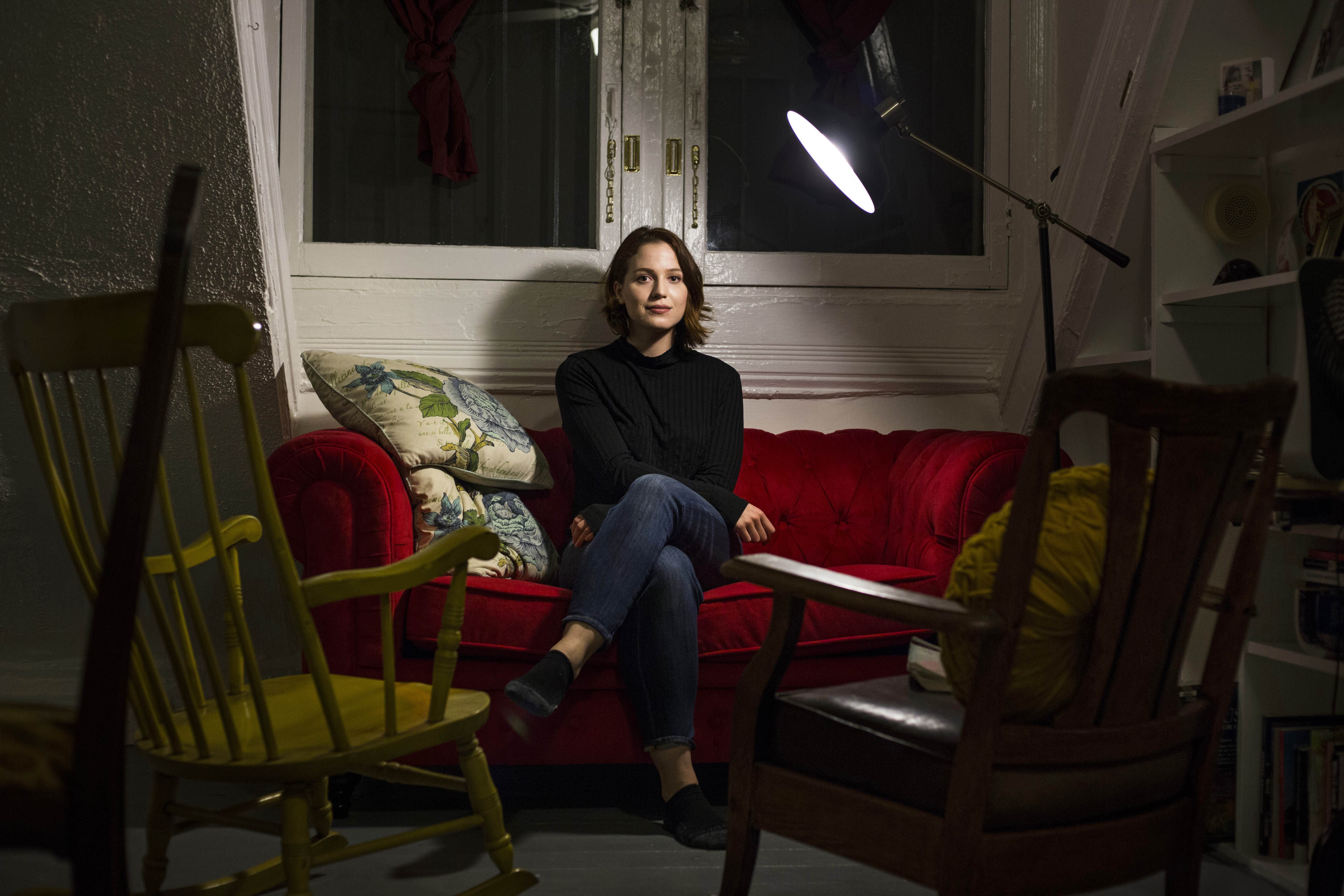 Josephine Zolynsky, 23, at her home in Midtown Detroit, on October 24, 2016. A student at Wayne State University studying to be a social worker, Zolynsky is firmly backing Democratic candidate Hillary clinton. "I just want to see more support for social programs," Zolynsky said. "Social welfare is political responsibility. So, complaining about taxes and how your taxes are going to go up, not necessarily. Taxes will be restructured, but if you make less than $250,000 a year your taxes aren't going to go up if you vote for Hillary. They won't. That's what she's already said and I mean, it's a huge melting pot down here."