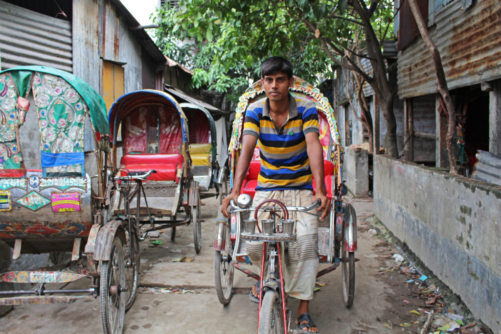 “Those who come to Dhaka are all poor, have no income,” said Kabir Hossain. “But those who are not poor, they choose to stay in the village. It is a better life there.” (Photo by Neha Thirani Bagri/GroundTruth)