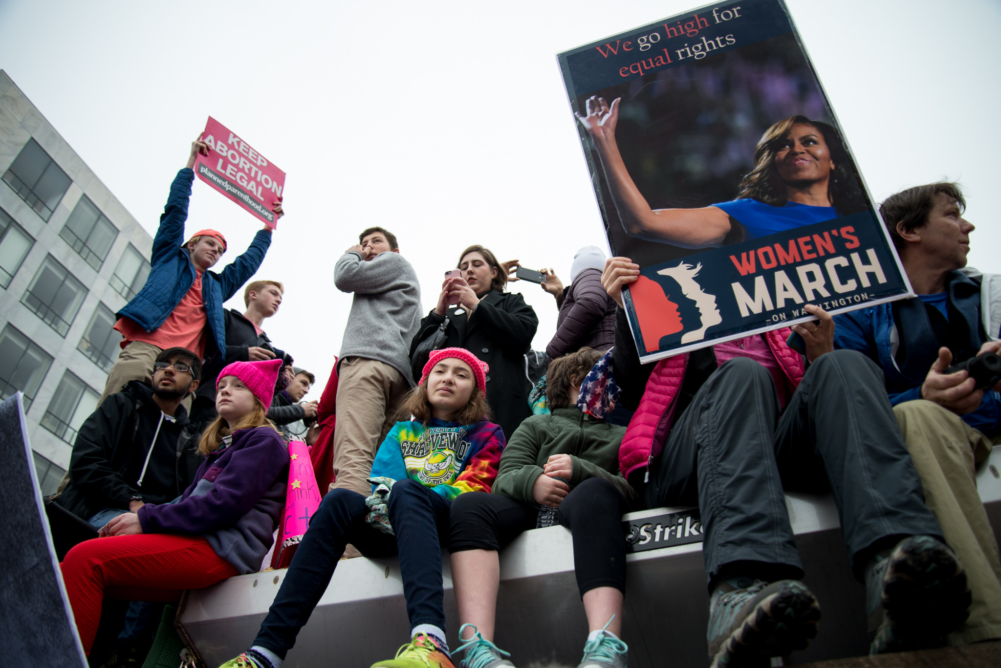 Protestors hold up signs for the Women's March on Washington in Washington, D.C. on Jan. 21, 2017. (Photo by VeryBusyPeople/Flickr User)