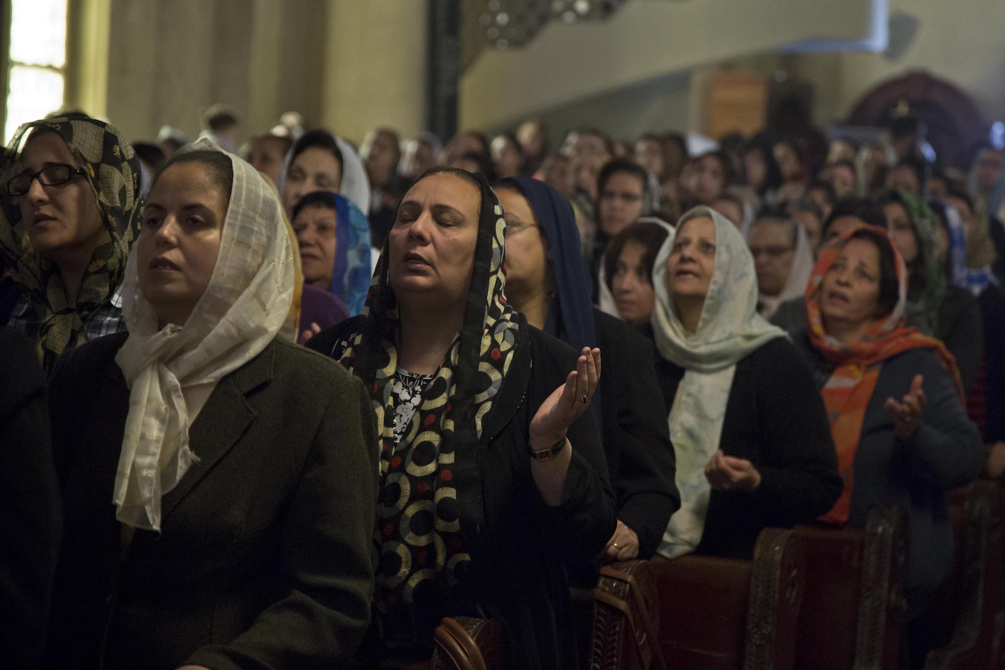 Worshippers gather for Maundy Thursday Mass in St Markos Church in Alexandria four days after the church was bombed during the Palm Sunday Mass. Alexandria, Egypt, April 13, 2017 (Photo by Roger Anis/GroundTruth)