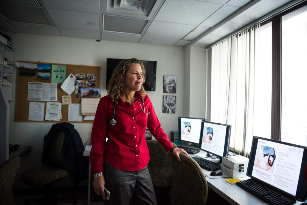 Dr. Cunningham, one of the providers on the forefront of the opioid crisis, is on the Mayor's Opioid Task Force. She poses for a portrait in her office at the Montefiore Comprehensive Care Center in the Bronx on Jan. 31, 2017. (Photo by Edwin Torres/GroundTruth)