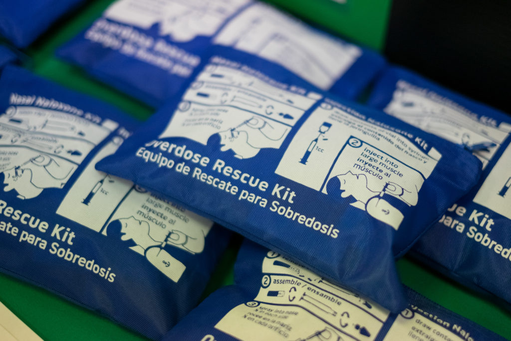 Naloxone rescue kits sit on the table at a drug clinic. (Photo by Edwin Torres/GroundTruth)