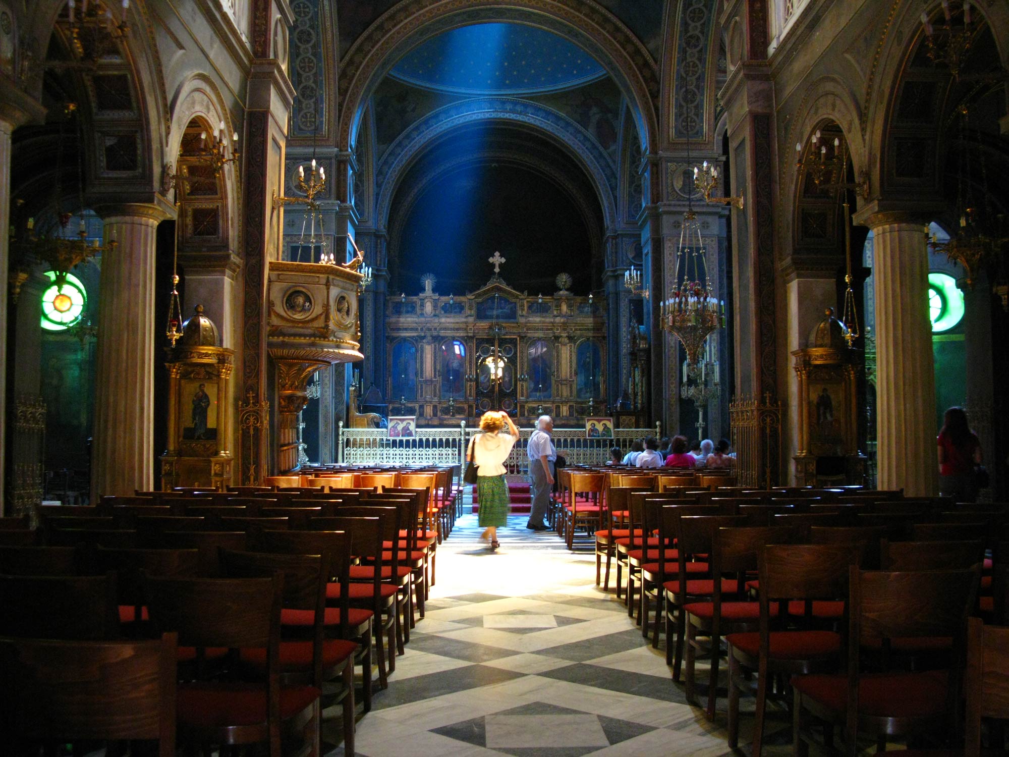 People stroll inside the Agia Irini Church in Athens, Greece. (Photo by Tilemahos Efthimiadis/GroundTruth)