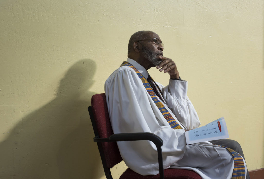 Dr. Amos C. Brown listens to a discussion about the budget with his congregation during a luncheon at the Third Baptist Church, where he is the pastor, in the Fillmore district of San Francisco, California, on Sunday, November 5, 2017. (Photo by Brittany Greeson)