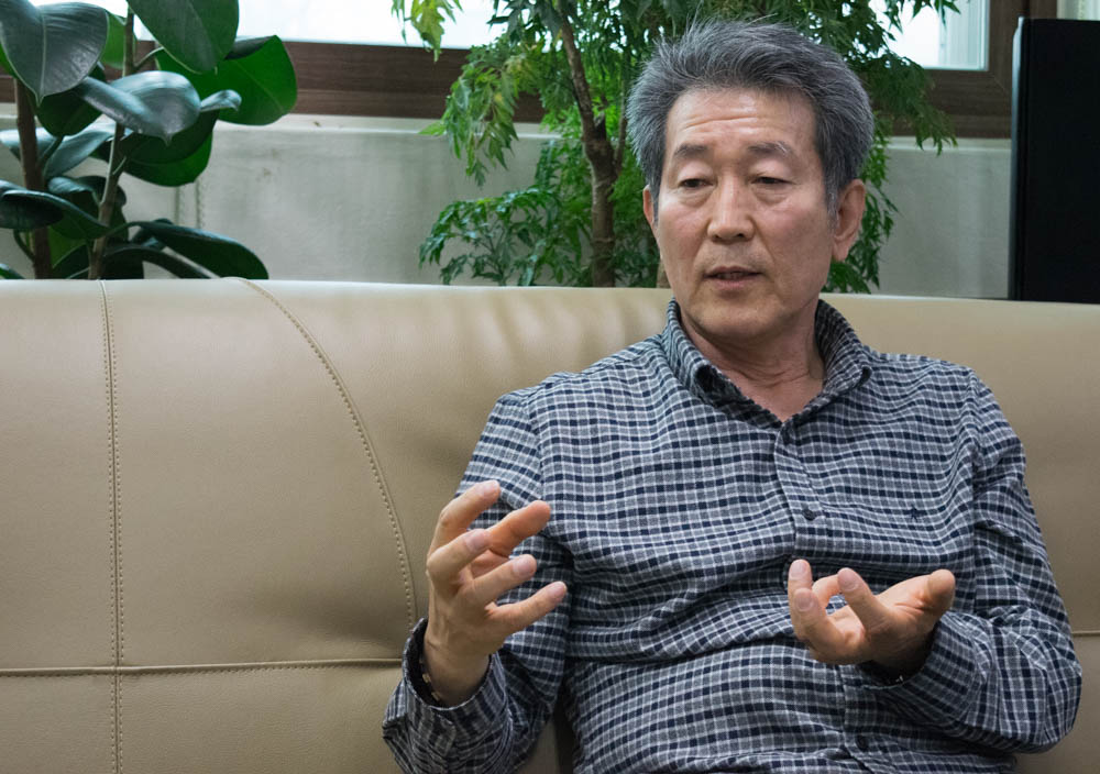 The Rev. Chun Ki Won was first inspired to work for North Koreans since he first went to the border as a businessman in 1995. He later became a pastor and founded a school and church to support North Koreans and help them integrate once they arrive in South Korea. (Rachel Cohrs/GroundTruth)