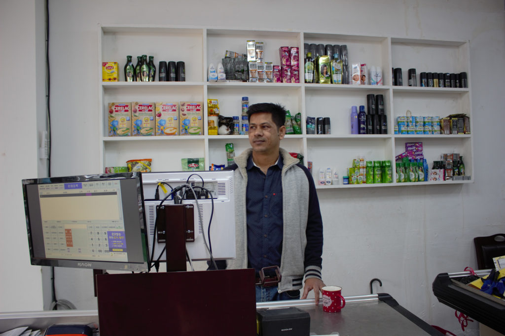 Mohammed Shohan Khan works for a relative's business in Seoul. Although educated as a pharmacist in Bangladesh, he wants to stay in Korea for as long as he can. (Razzan Nakhlawi/GroundTruth)