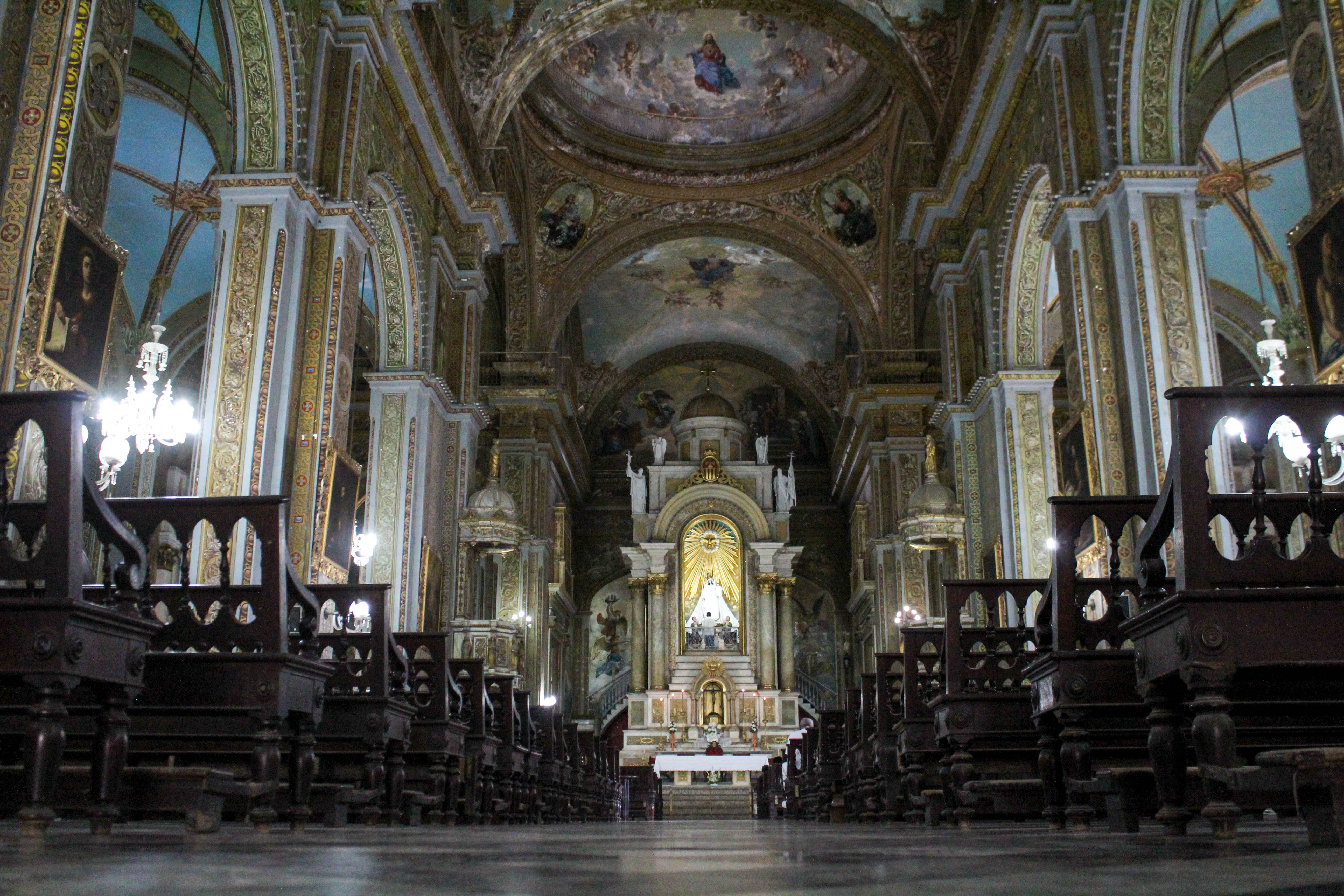 Our Lady of Mercy church, a shrine church dedicated to Saint Mercedes which houses a grand statue of her, is typically filled with Santería worshippers. Those “making saint” in Santería are obligated to visit the church on their seventh day of the initiation process to pray to the image of Mercedes, and many of those whose patron orisha is Obatalá visit the church on the 24th of each month to honor her September feast day. (Photo by Paxtyn Merten/The GroundTruth Project)