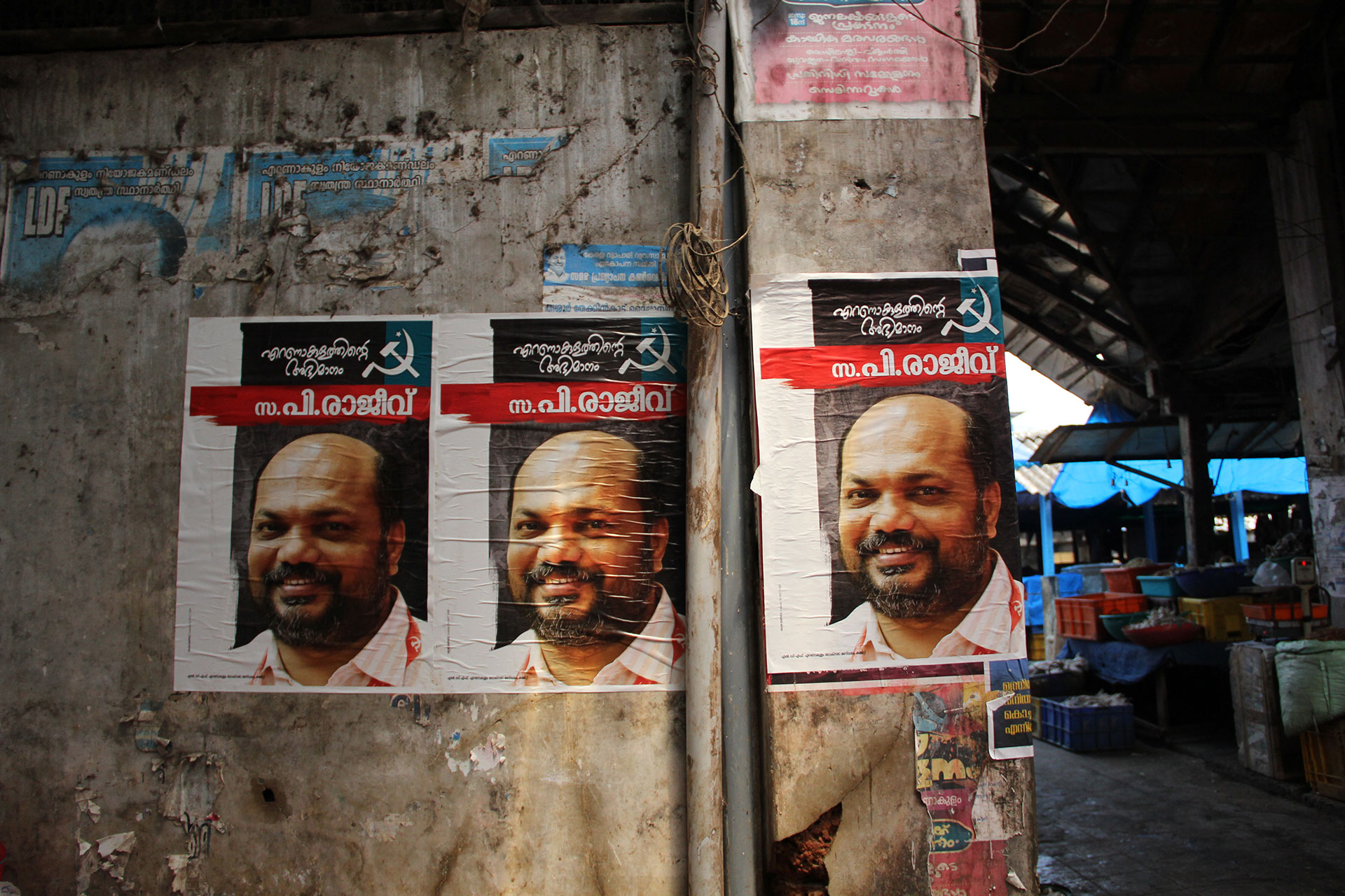 Posters in Kochi promote P. Rajeev, the CPI(M)'s candidate for parliament in the Ernakulam district. (Photo by Diana Kruzman/GroundTruth)