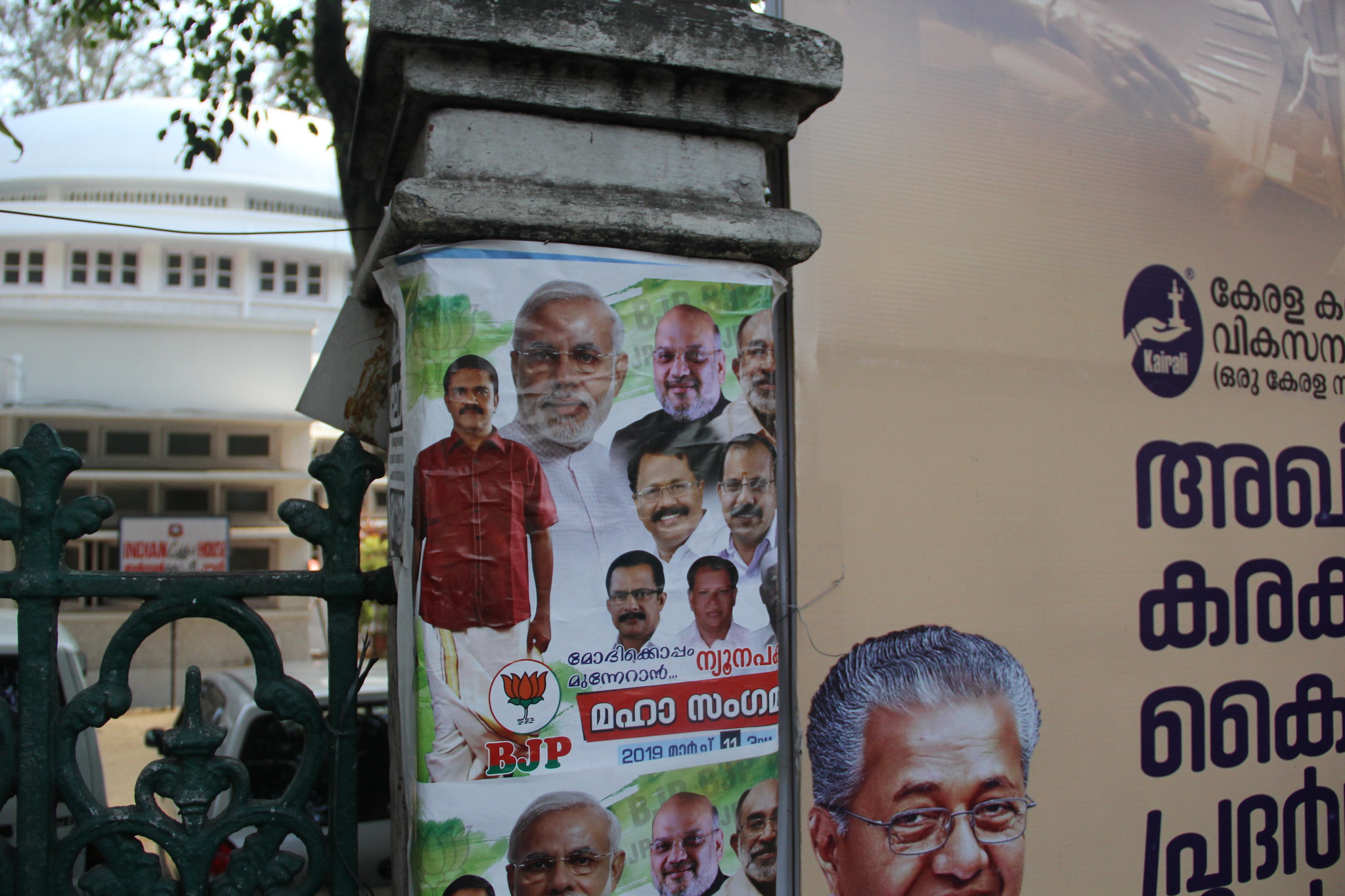 A BJP political poster in Thiruvananthapuram. (Photo by: Diana Kruzman)